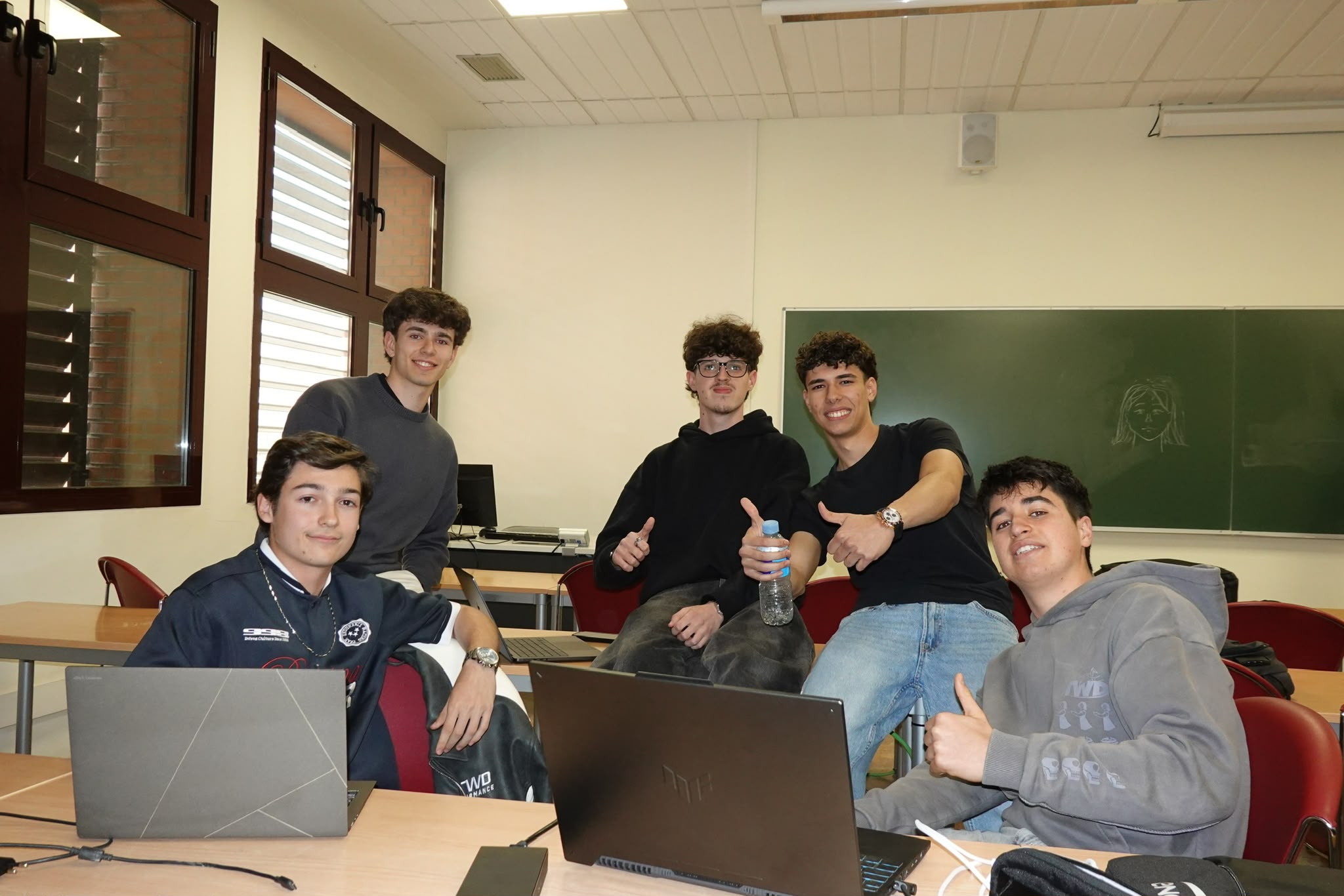 Celebrating with the hackathon team